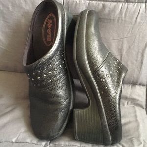 Black leather clogs